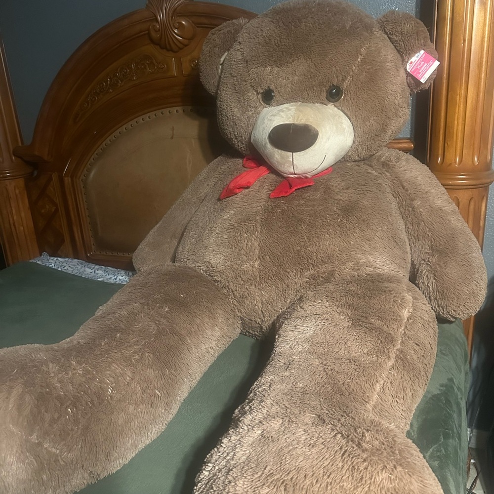 Giant Brown Teddy Bear with Red Bow